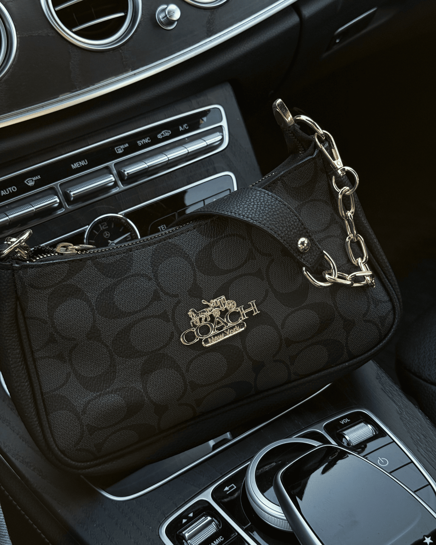 Black and pink Coche baguette bags styled together, perfect for
aesthetic accessories