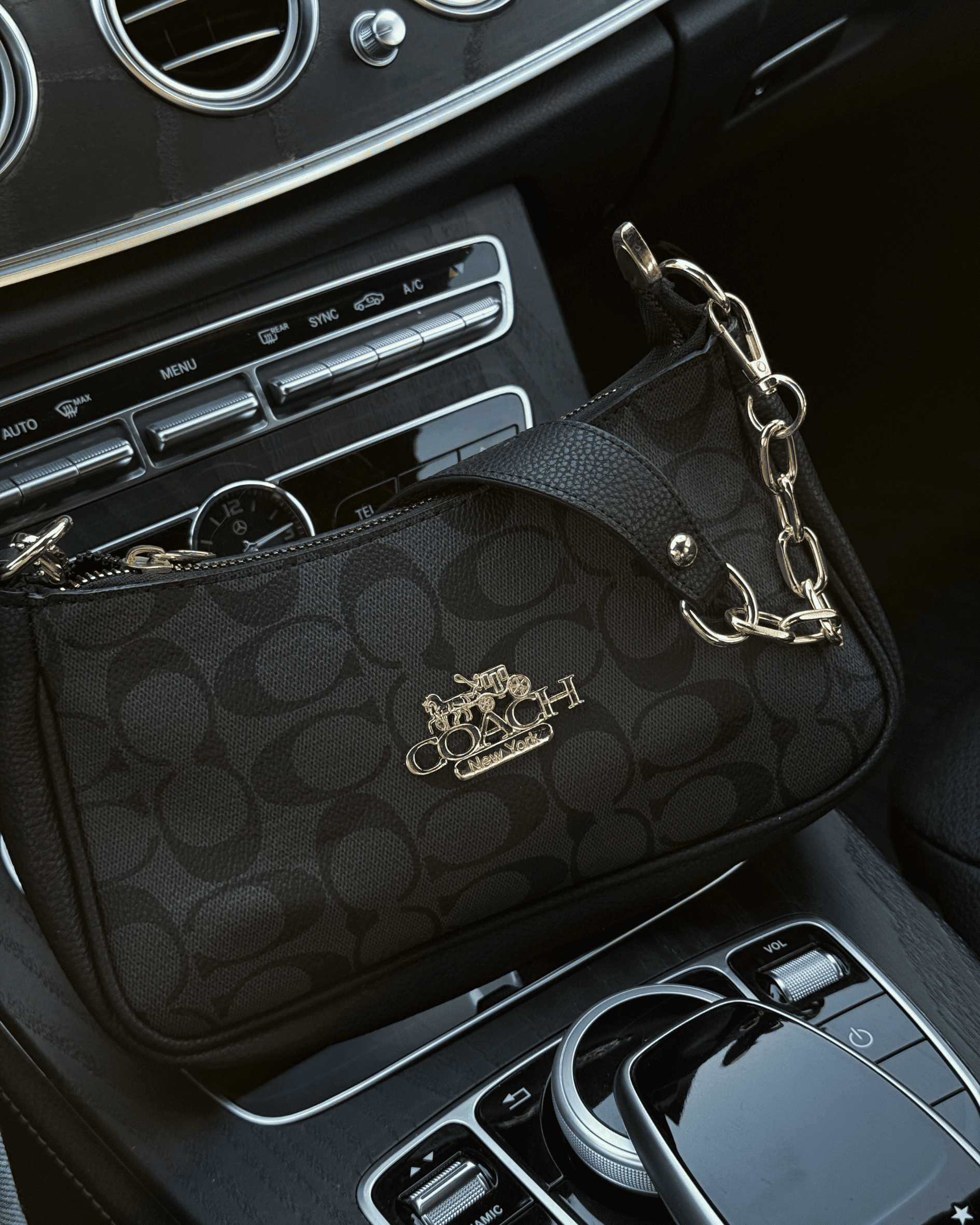 Black and pink Coche baguette bags styled together, perfect for
aesthetic accessories