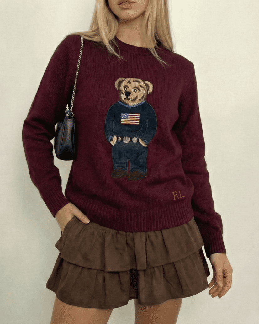 Aesthetic outfit styling of the Bordeaux red bear sweater for a moody vintage look in Lebanon.
