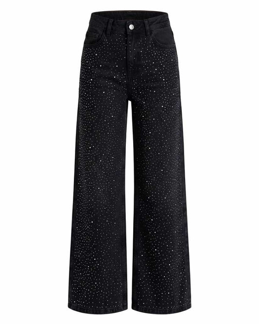 Front view of high-waisted, wide-leg washed black denim jeans covered in all-over sparkly rhinestone embellishments against a white background.