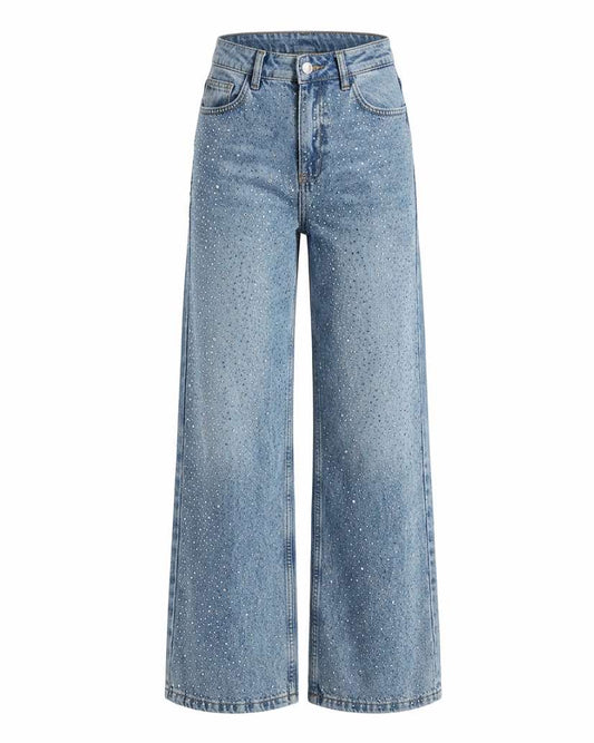  Front view of high-waisted, wide-leg vintage light wash blue denim jeans covered in all-over sparkly rhinestone embellishments against a white background.